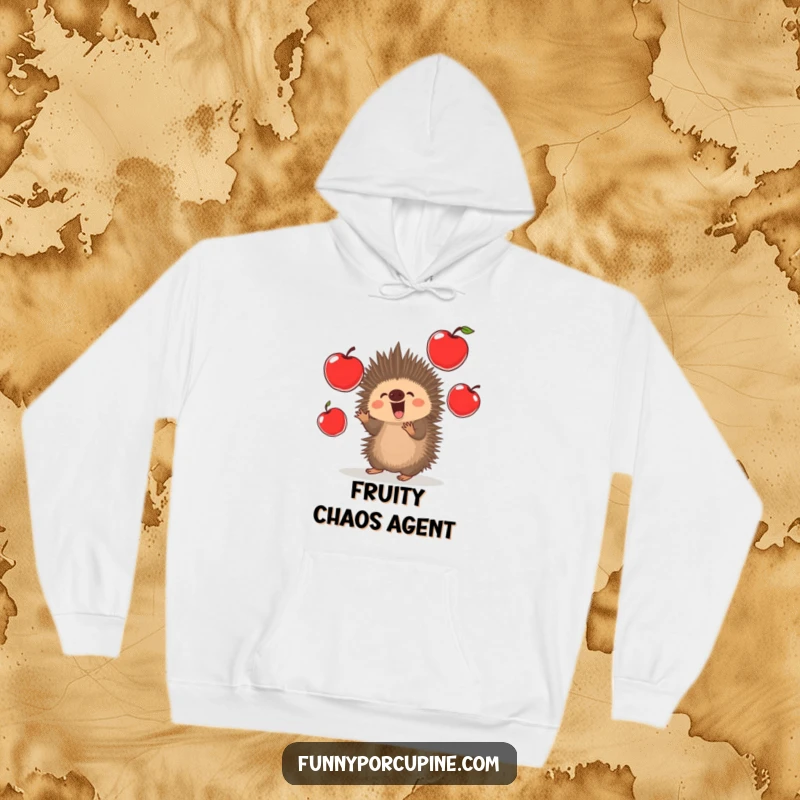 Funny Porcupine Hoodie: A kawaii porcupine excitedly juggles several large, red apples with cheerful intensity and focus.