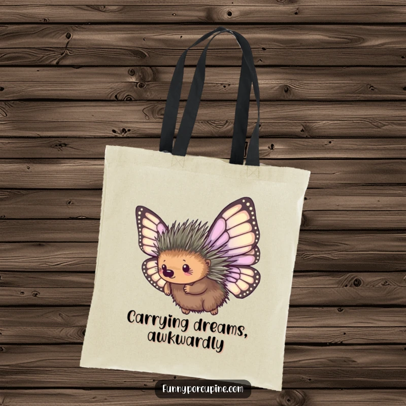 Funny tote bag showcasing a porcupine with large, mismatched butterfly wings, humorously attempting flight, a unique and comical accessory.